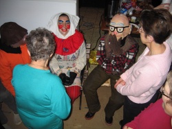 A group of Mid-Lent revellers wondering if anyone will recognize them, at Saint Joseph du Moine, Nova Scotia, 2007, Collection Georges Arsenault