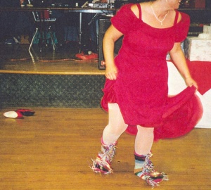 A wedding goer dancing the sock dance in Ontario, circa 1983