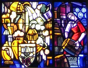 Close-up of a stained-glass window devoted to Saint Arnould, patron saint of brewers 