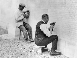 Engraving the names of the fallen on the base of the Canadian War Memorial at Vimy