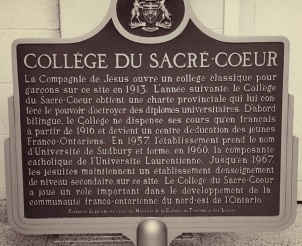 A plaque tells the history of the college