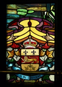 Quebec’s coat of arms on the stained glass adorning the entrance to Le Parlementaire Restaurant