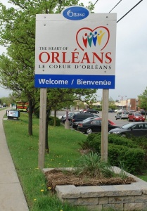 A bilingual sign welcoming people to a French-speaking neighbourhood in Orléans 