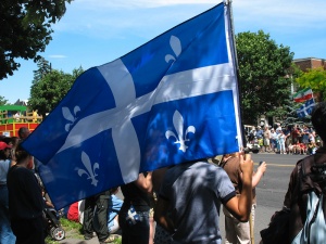 Quebec flag hold by a citizen, 2007