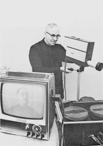 Father Lemieux recording Aldéric Perreault
